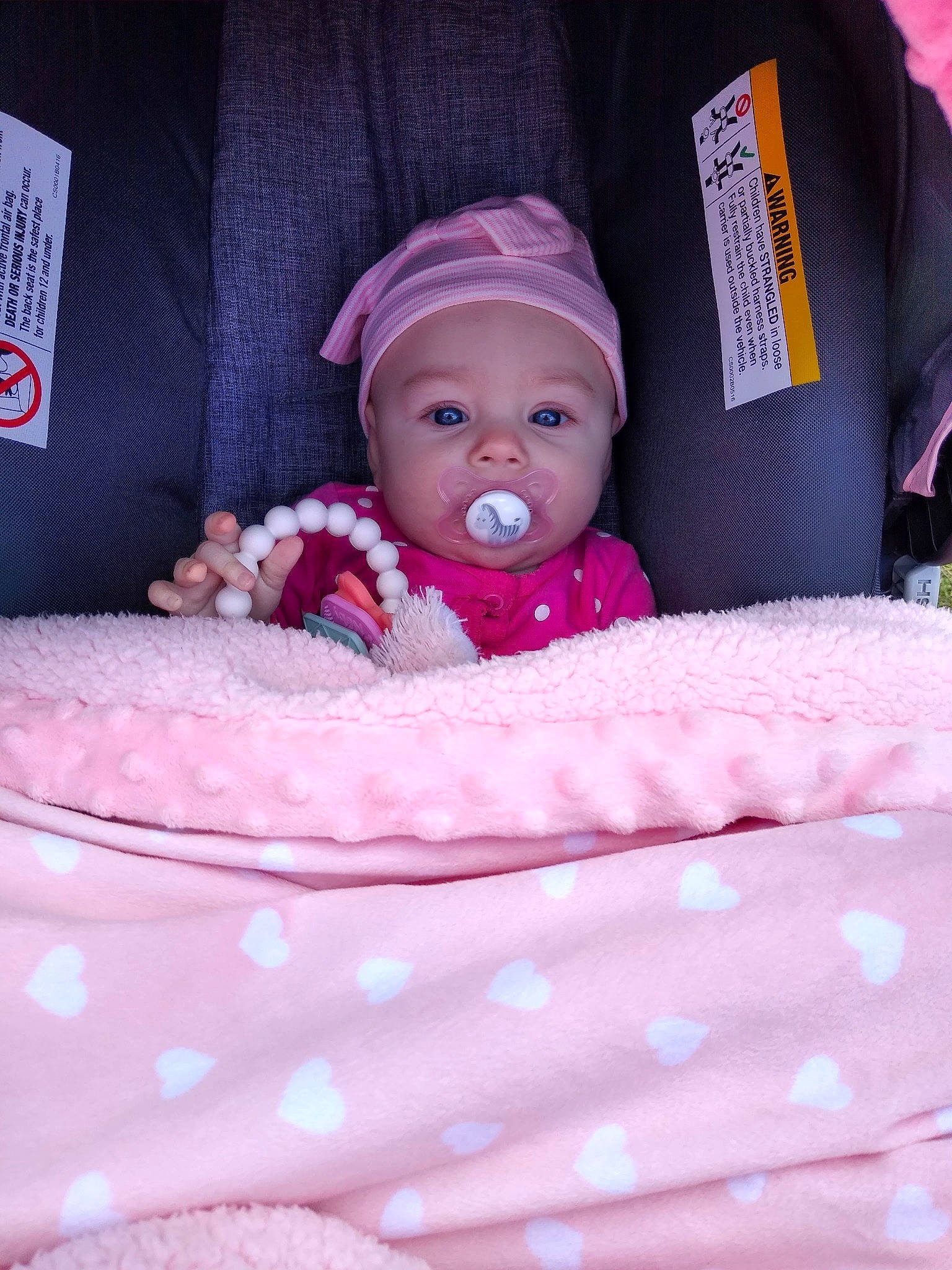 Kingsley joined the competition — help win amazing prizes! baby, baby_products, baby_safety, baby_sleeping, baby_toddler_clothing, cap, child, comfort, eye, headgear, headwear, human_body, knit_cap, linens, magenta, pattern, person, pink, purple, sitting