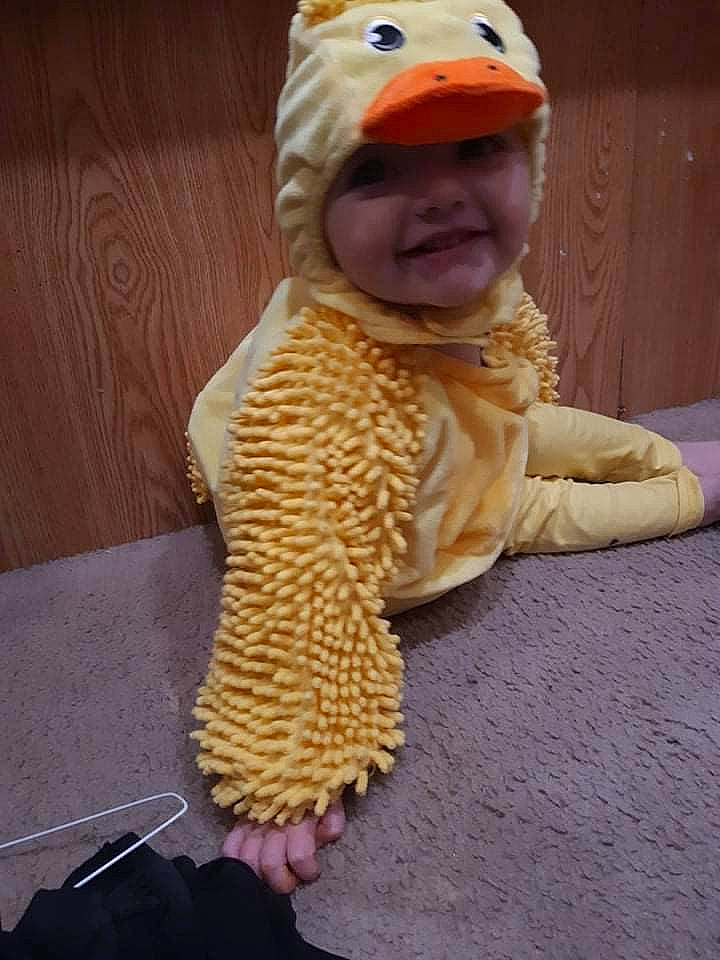 Addylynn is registered to the contest to win money with this photo: baby, baby_toddler_clothing, beanie, cap, child, costume_hat, flooring, fur, headgear, headwear, joy, pattern, person, sitting, sleeve, smile, thumb, toddler, toy, woolen