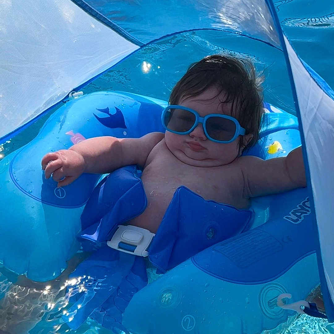 Kode joined the competition — help win amazing prizes! baby, blue, child, chubby, cute, float, floating, fun, inflatable, leisure, outdoor, pool, relaxing, summer, sunglasses, sunny, sunshade, swimming, vacation, water