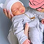 Legend joined the competition — help win amazing prizes! architecture, baby, blanket, bodypart, bonnet, building, clothing, face, finger, glove, hand, hat, head, hospital, newborn, people, person, photography, portrait, sleeping