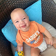 Legend joined the competition — help win amazing prizes! baby, bed, chair, clothing, couch, cushion, diaper, face, furniture, happy, head, homedecor, person, photography, pillow, portrait, shorts, sitting, smile, t_shirt