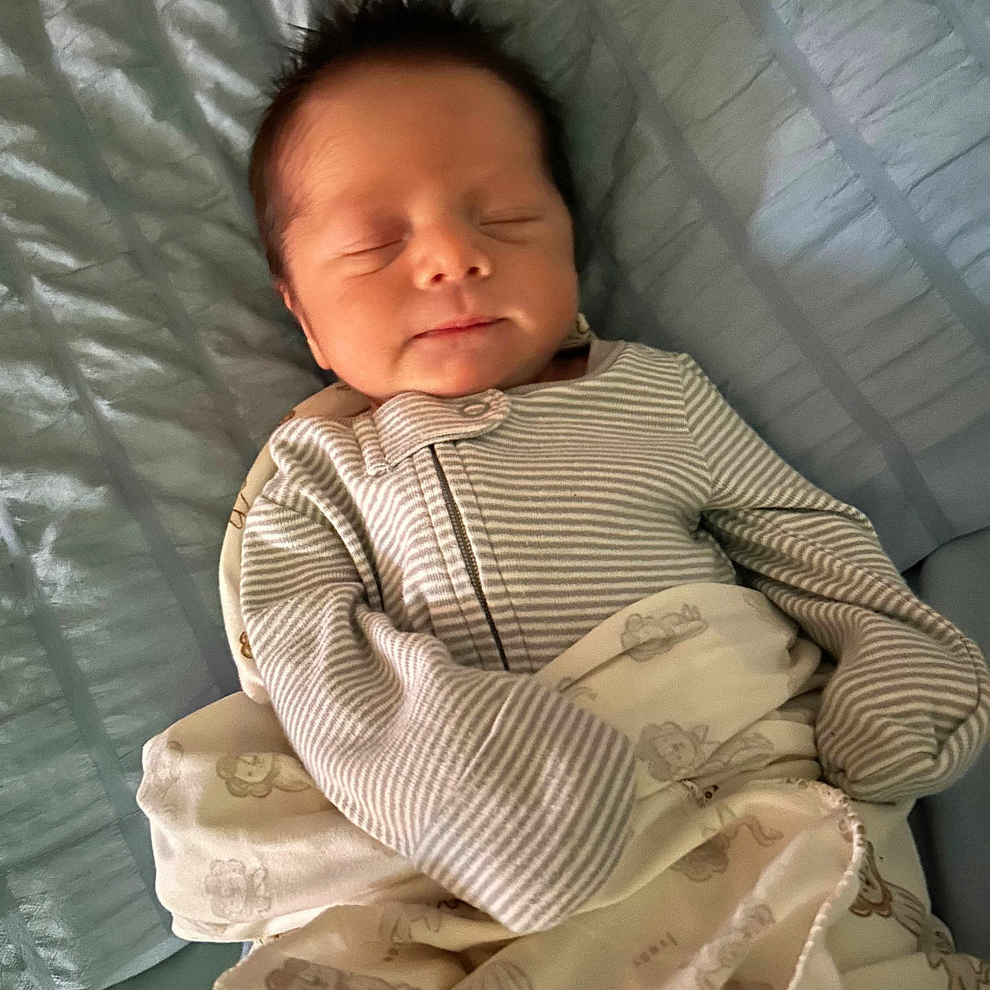 Isaiah joined the competition — help win amazing prizes! newborn, baby, sleeping, blanket, pajamas, striped_clothing, bed, quilted_bedspread, infant, cute, peaceful, indoors, portrait, resting, child, soft_lighting, toddler, sleep, cozy, hair