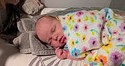 Lilith joined the competition — help win amazing prizes! baby, bed, blanket, child, colorful, comfort, cozy, cute, face, floral, indoors, infant, newborn, peaceful, portrait, relaxation, resting, sleeping, soft, towel