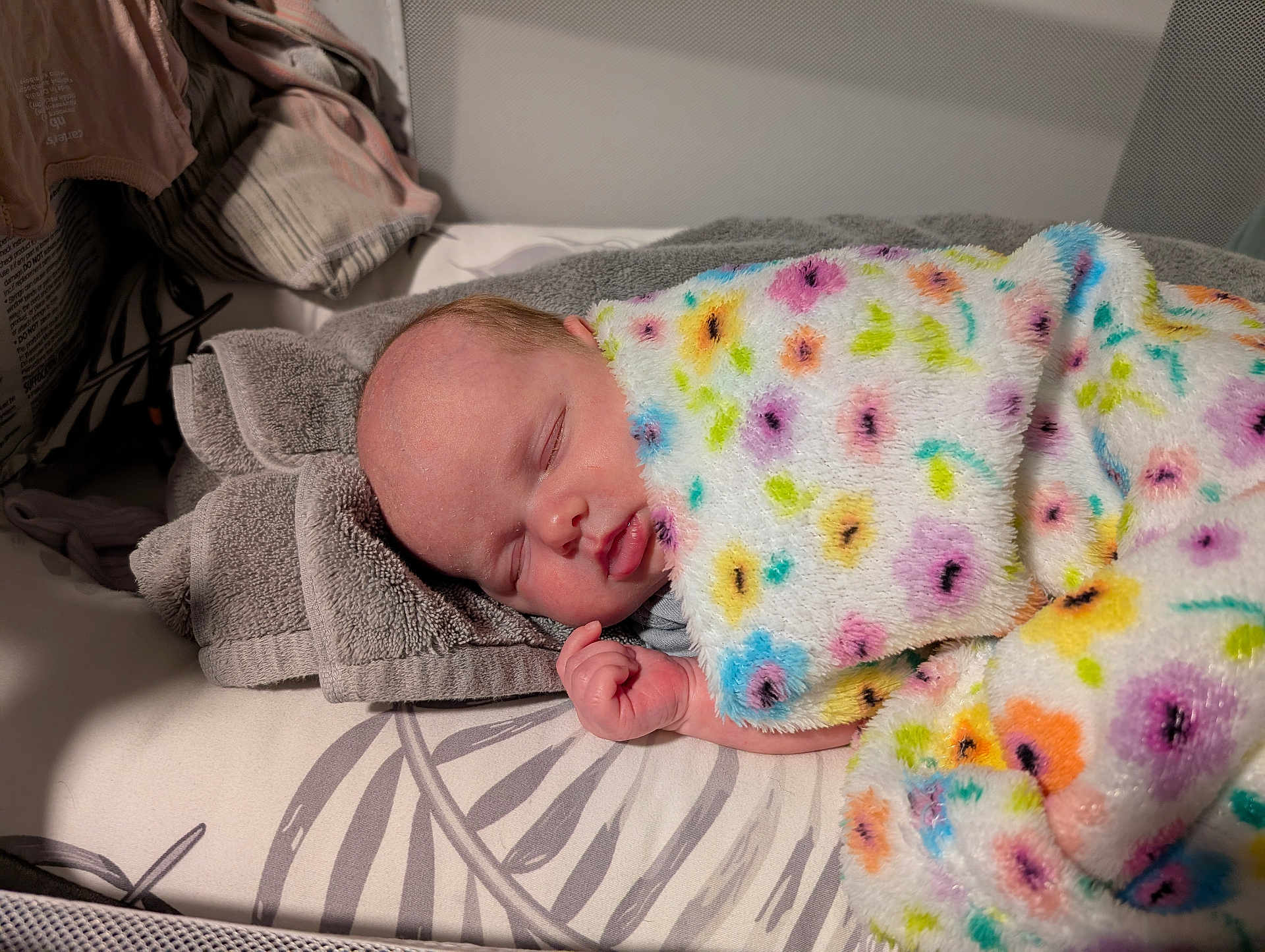 Lilith joined the competition — help win amazing prizes! baby, sleeping, blanket, colorful, floral, towel, bed, resting, infant, peaceful, soft, cozy, child, portrait, indoors, cute, newborn, comfort, relaxation, face