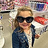 Leah joined the competition — help win amazing prizes! child, girl, sunglasses, smile, denim_jacket, store, retail, aisle, products, beauty, accessories, floor, clothing, person, happy, shopping, casual, hair, portrait, indoor