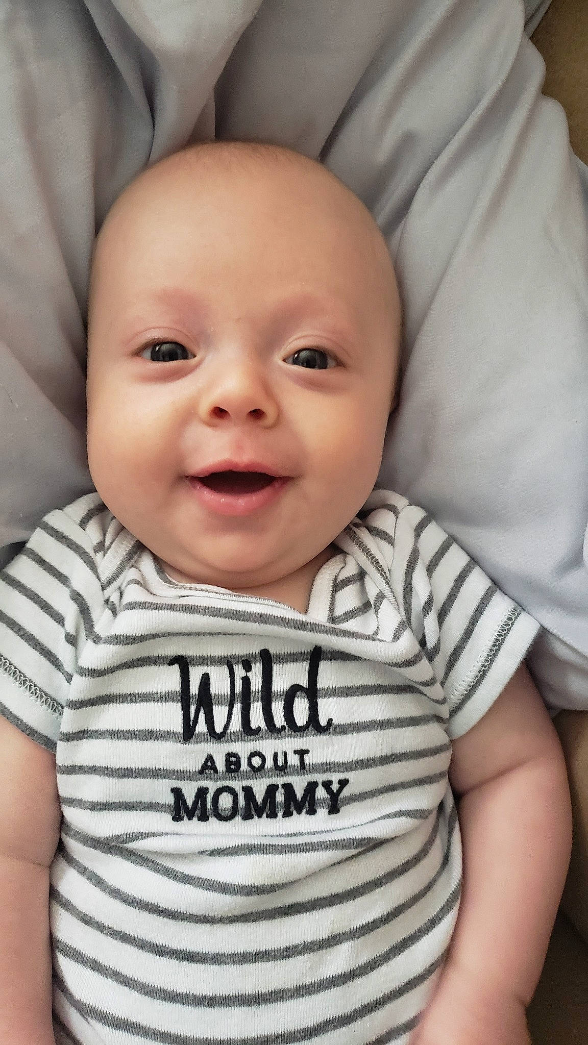 Dorian joined the competition — help win amazing prizes! baby, baby_making_funny_faces, baby_products, baby_toddler_clothing, cheek, child, chin, eye, face, facial_expression, forehead, happy, head, lip, nose, person, product, skin, smile, t_shirt