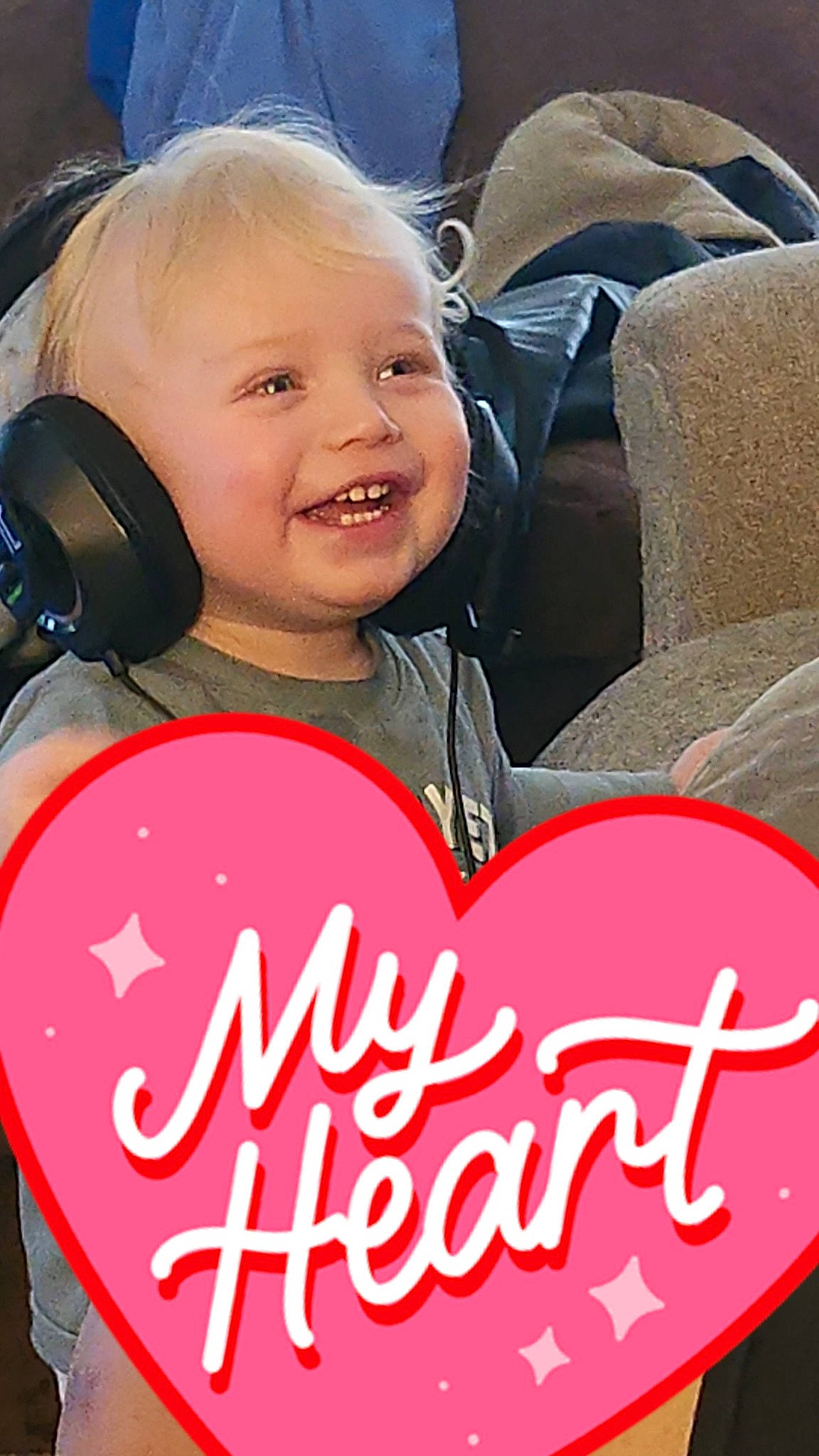 Doran is registered to the contest to win money with this photo: baby_carriage, baby_products, beauty, blond, car_seat, cheek, child, comfort, event, eye, facial_expression, font, fun, happy, joy, material_property, organ, person, photo_caption, pink