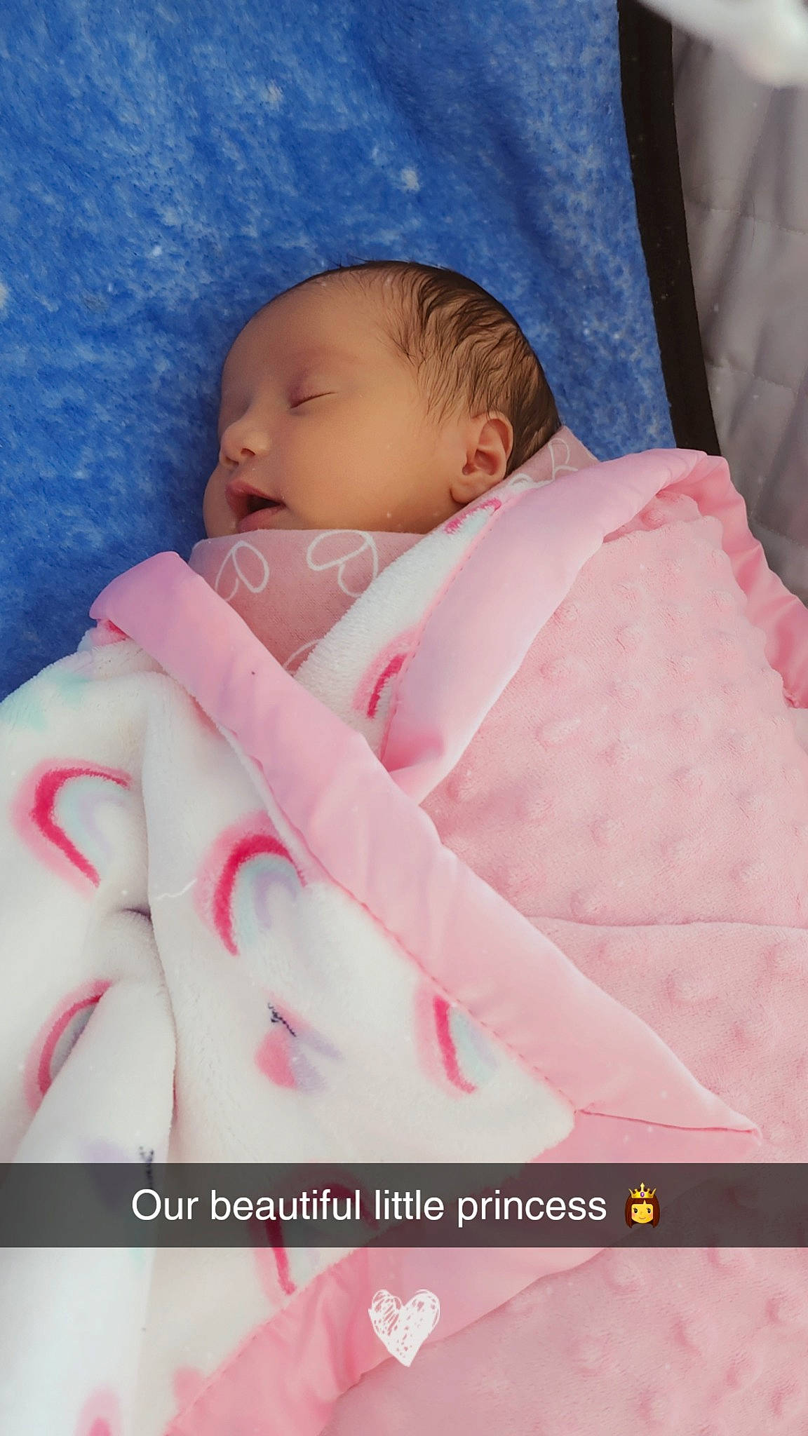 Scarlett is registered to the contest to win money with this photo: baby, baby_products, baby_safety, baby_sleeping, baby_toddler_clothing, bedtime, cheek, child, comfort, infant_bed, linens, magenta, nail, pattern, peach, person, pink, sitting, sleeve, thumb