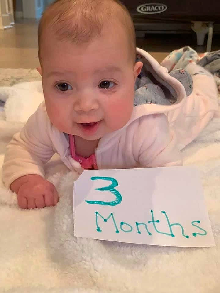 Lyla is registered to the contest to win money with this photo: baby, baby_toddler_clothing, cheek, child, face, forehead, head, nose, person, skin, smile, toddler, tummy_time