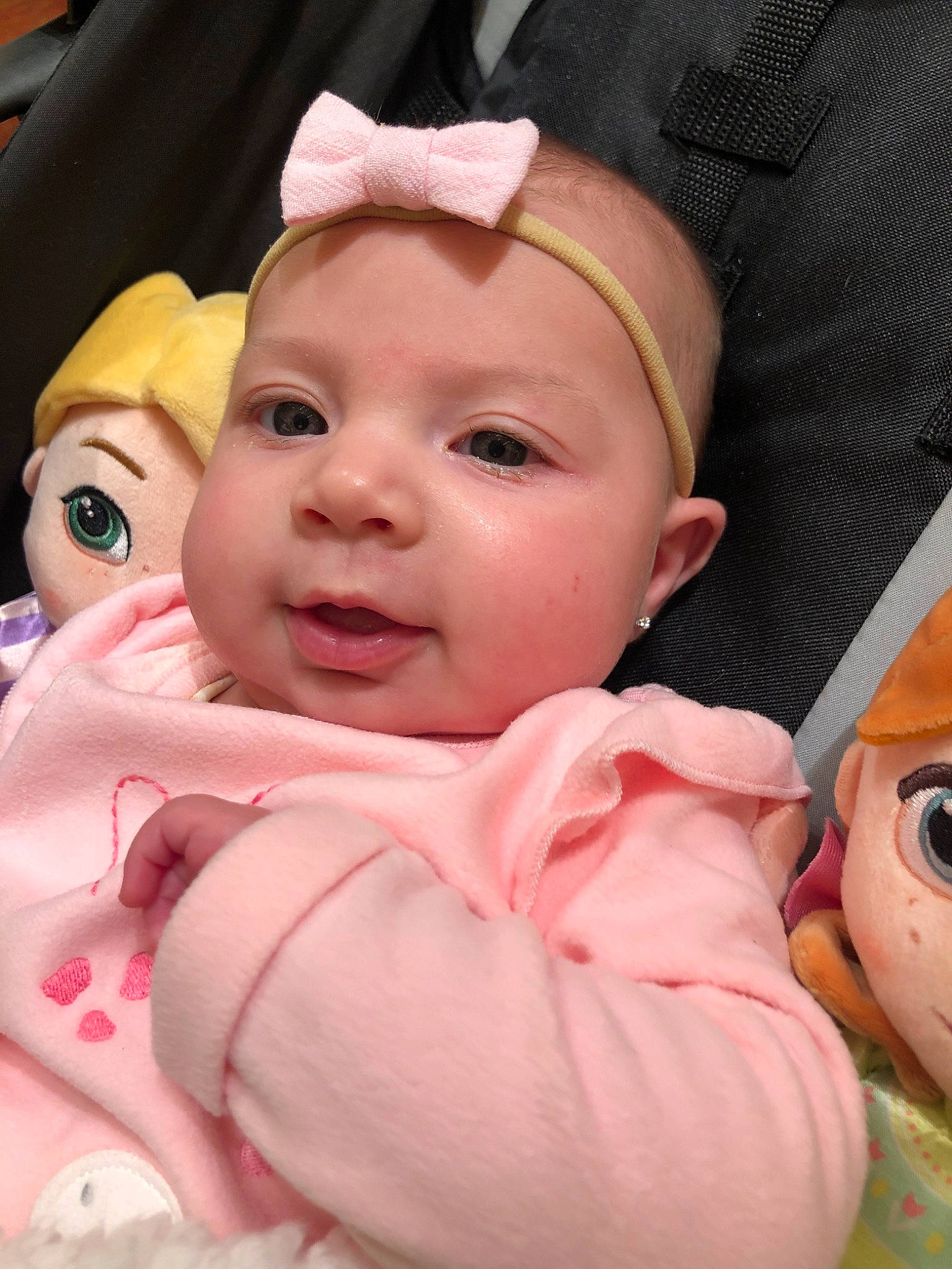 Lyla is registered to the contest to win money with this photo: baby, cheek, child, eye, face, head, headwear, lip, person, pink, skin, toddler