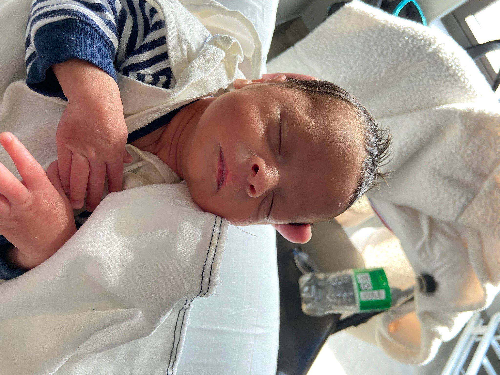 Keziah is registered to the contest to win money with this photo: baby, baby_products, baby_toddler_clothing, bottle, child, comfort, drinkware, elbow, finger, gesture, hand, hat, health_care, mouth, person, plastic_bottle, product, skin, toddler, water