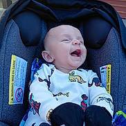 Sebastian joined the competition — help win amazing prizes! baby, blanket, canopy, car_seat, closeup, cute, fabric_pattern, happy, infant, laughing, mittens, mouth_open, neon_light, onesie, outdoor, portrait, seat_padding, smiling, warning_label, wooden_structure