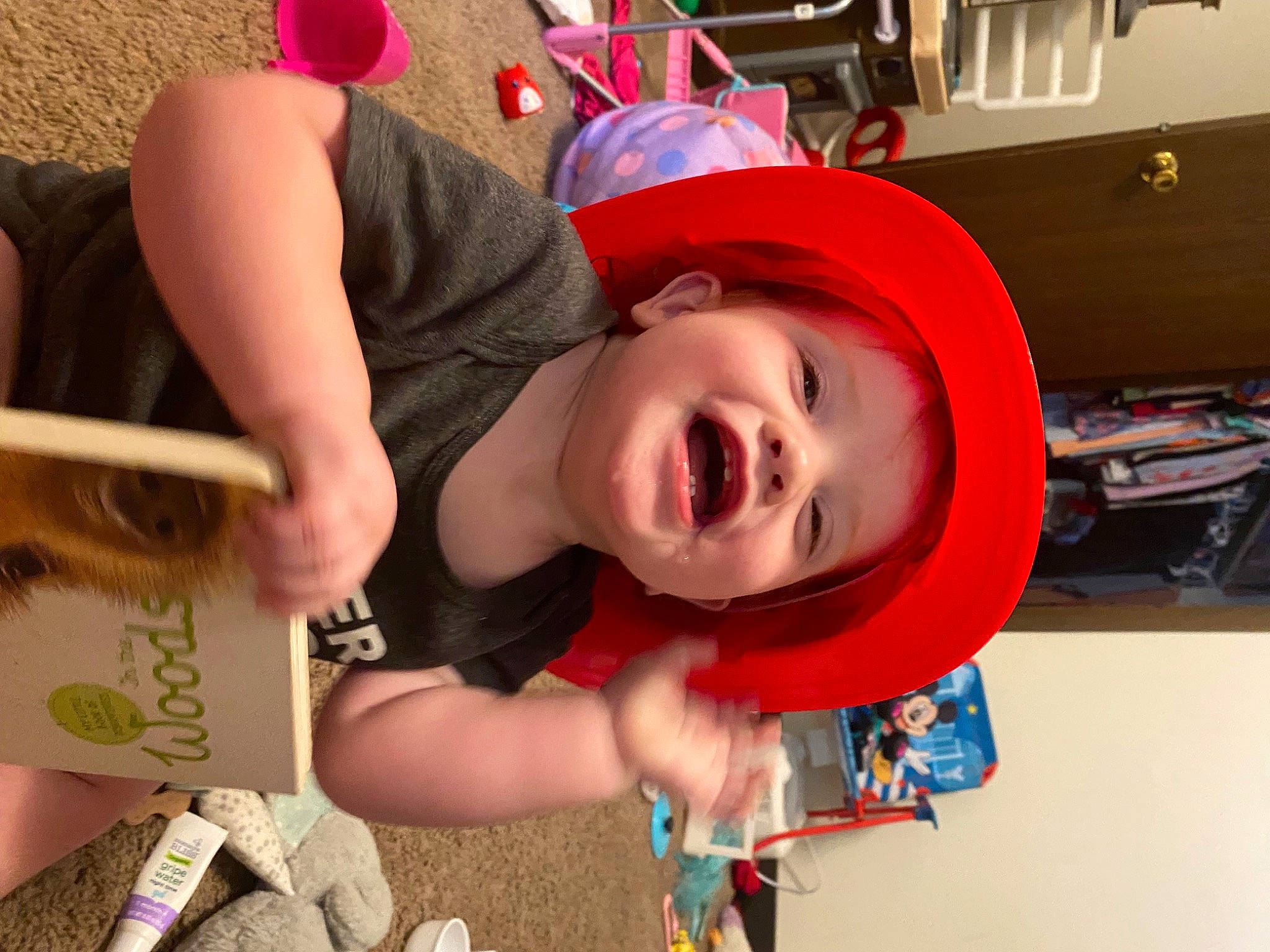 Hudson is registered to the contest to win money with this photo: baby, baby_toddler_clothing, cap, child, event, fashion_accessory, fun, happy, hat, headgear, leisure, party, party_supply, person, play, recreation, room, smile, sun_hat, toddler