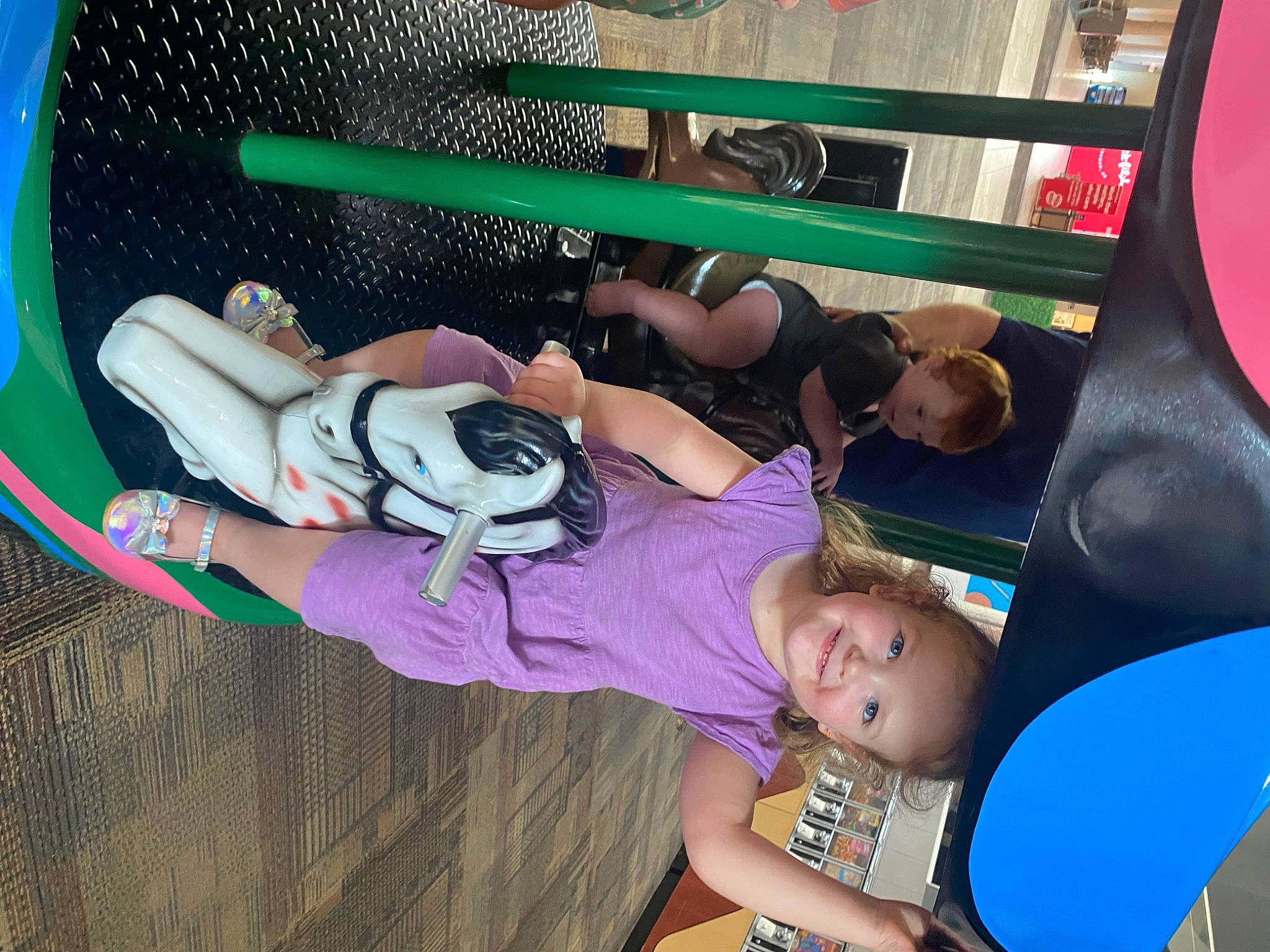Paislee joined the competition — help win amazing prizes! auto_part, automotive_exterior, bumper, child, cool, fun, happy, hat, joy, leisure, magenta, motor_vehicle, person, purple, recreation, t_shirt, thigh, toddler, tree, vehicle_door
