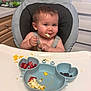 Zachary joined the competition — help win amazing prizes! baby, baby_food, blue_plate, bottle, cabinet, child, counter, crab_shaped_plate, cute, face, feeding, food, hand, high_chair, kitchen, mealtime, messy, plate, smiling, utensils