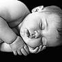 baby, black_and_white, calm, chubby, close_up, cute, expression, face, hands, infant, monochrome, newborn, peaceful, portrait, resting, skin, sleeping, soft_lighting, tender, young_child