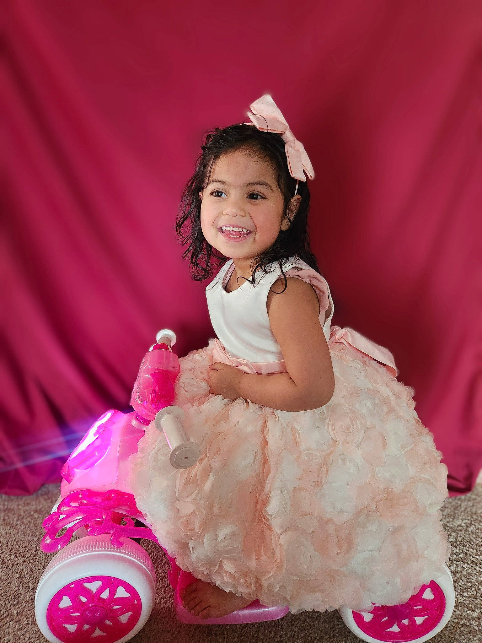 Aisha joined the competition — help win amazing prizes! baby_toddler_clothing, child, dress, event, flash_photography, fun, hairstyle, happy, joy, magenta, peach, person, petal, pink, purple, ruffle, shoe, sitting, skin, smile