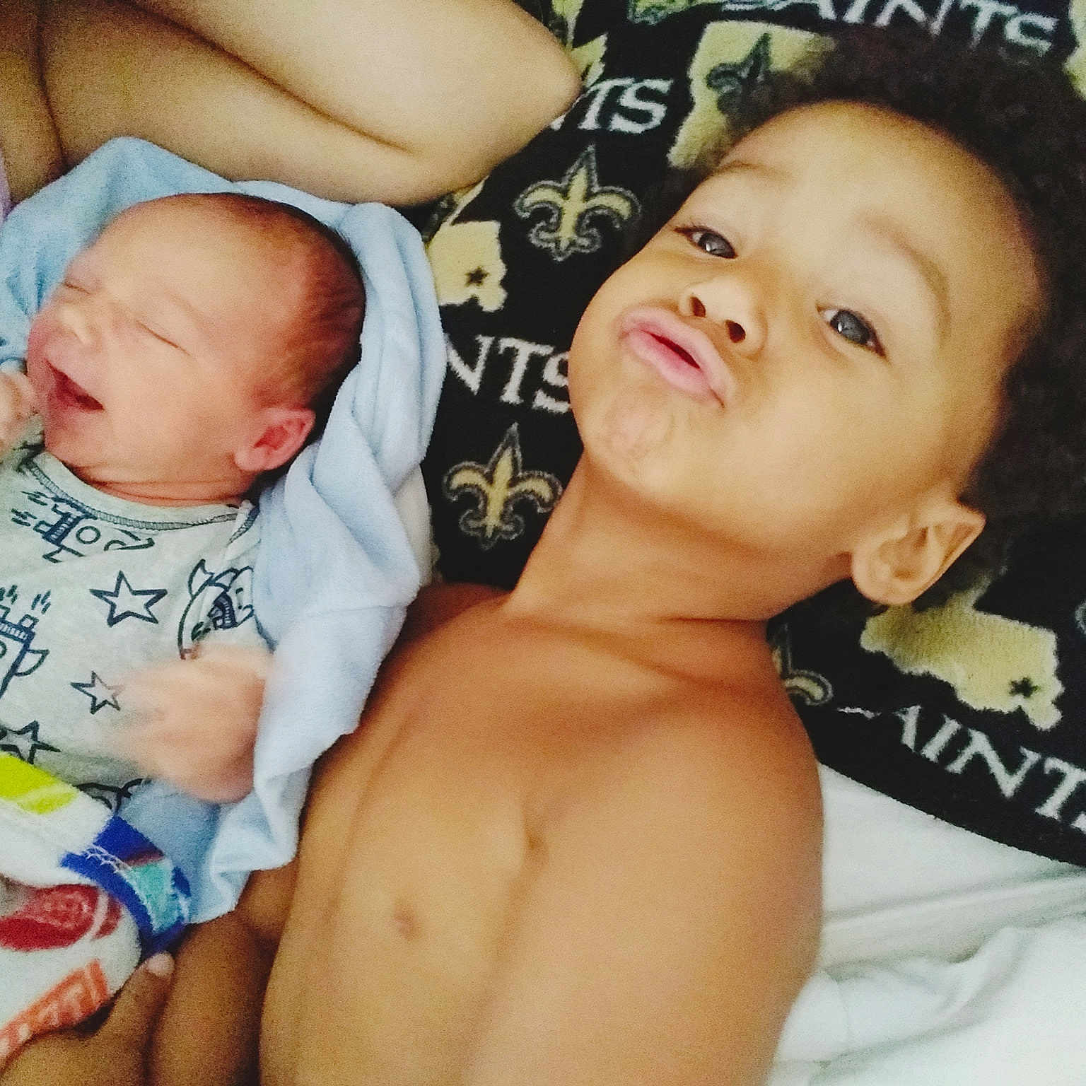 Carmelo is registered to the contest to win money with this photo: baby, baby_sleeping, birth, cheek, chest, child, cool, face, happy, head, human, love, muscle, nap, person, selfie, sibling, sleep, smile, toddler