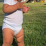 Izabella joined the competition — help win amazing prizes! toddler, child, grass, outdoor, sunhat, onesie, white_clothing, sandals, summer, standing, lawn, deck, red_cups, sunlight, baby, chubby_legs, side_view, nature, casual, daytime