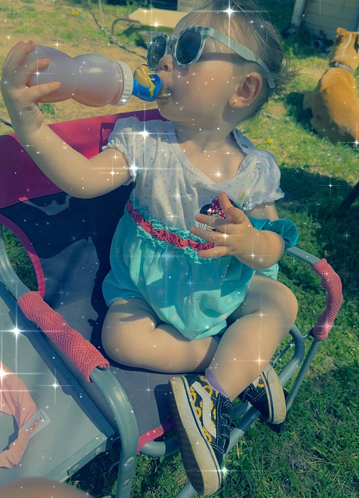 Willow joined the competition — help win amazing prizes! child, doll, dress, electric_blue, foot, fun, grass, happy, hat, human_leg, leisure, person, personal_protective_equipment, pink, plastic, play, recreation, sandal, sitting, thigh