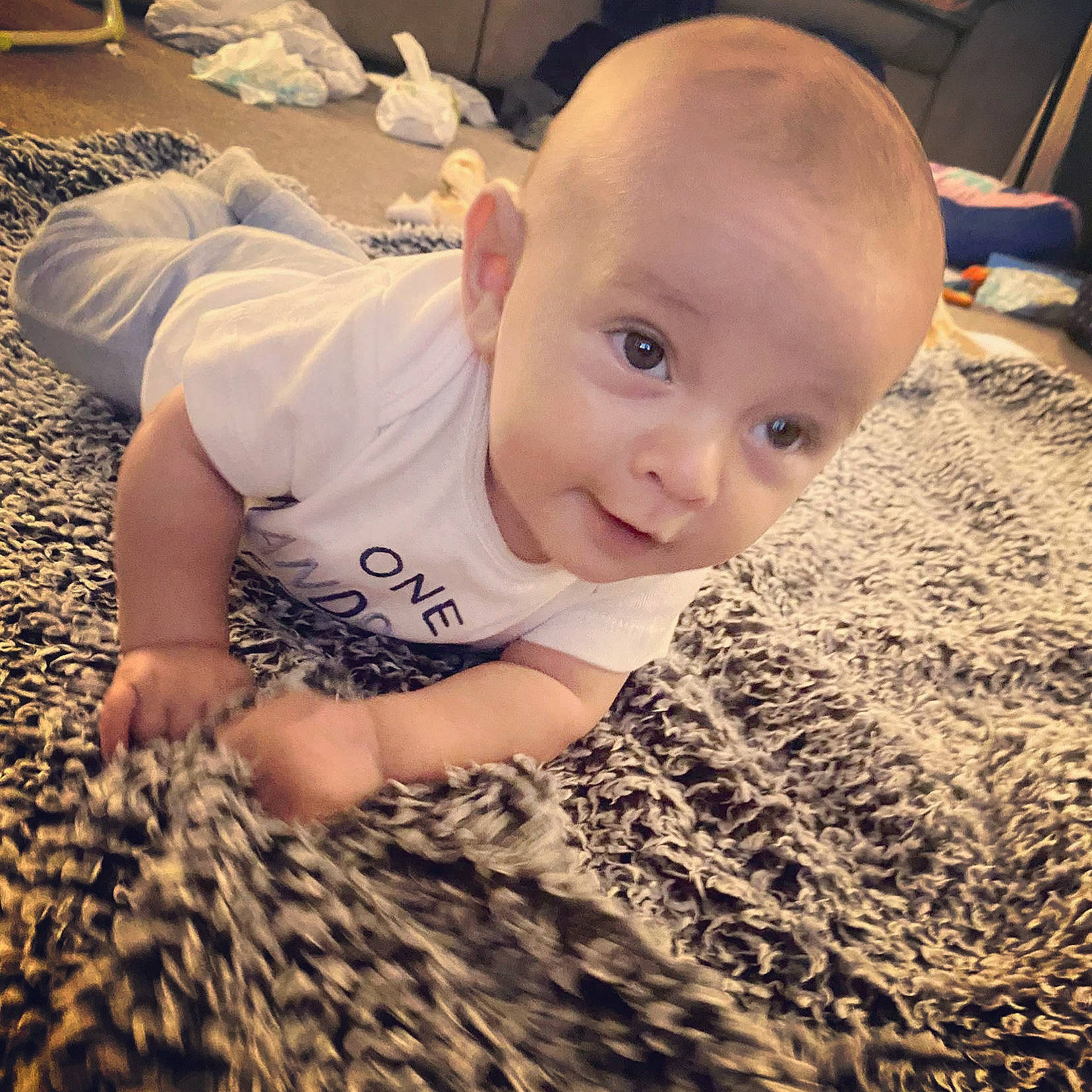 Jaxsyn is registered to the contest to win money with this photo: baby, cheek, child, eye, face, flooring, head, nose, person, toddler