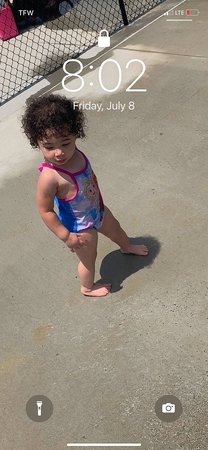 Kaylen joined the competition — help win amazing prizes! asphalt, barefoot, beach, cool, electric_blue, font, foot, fun, happy, human_body, human_leg, leg, leisure, logo, ocean, person, recreation, sandal, t_shirt, thigh