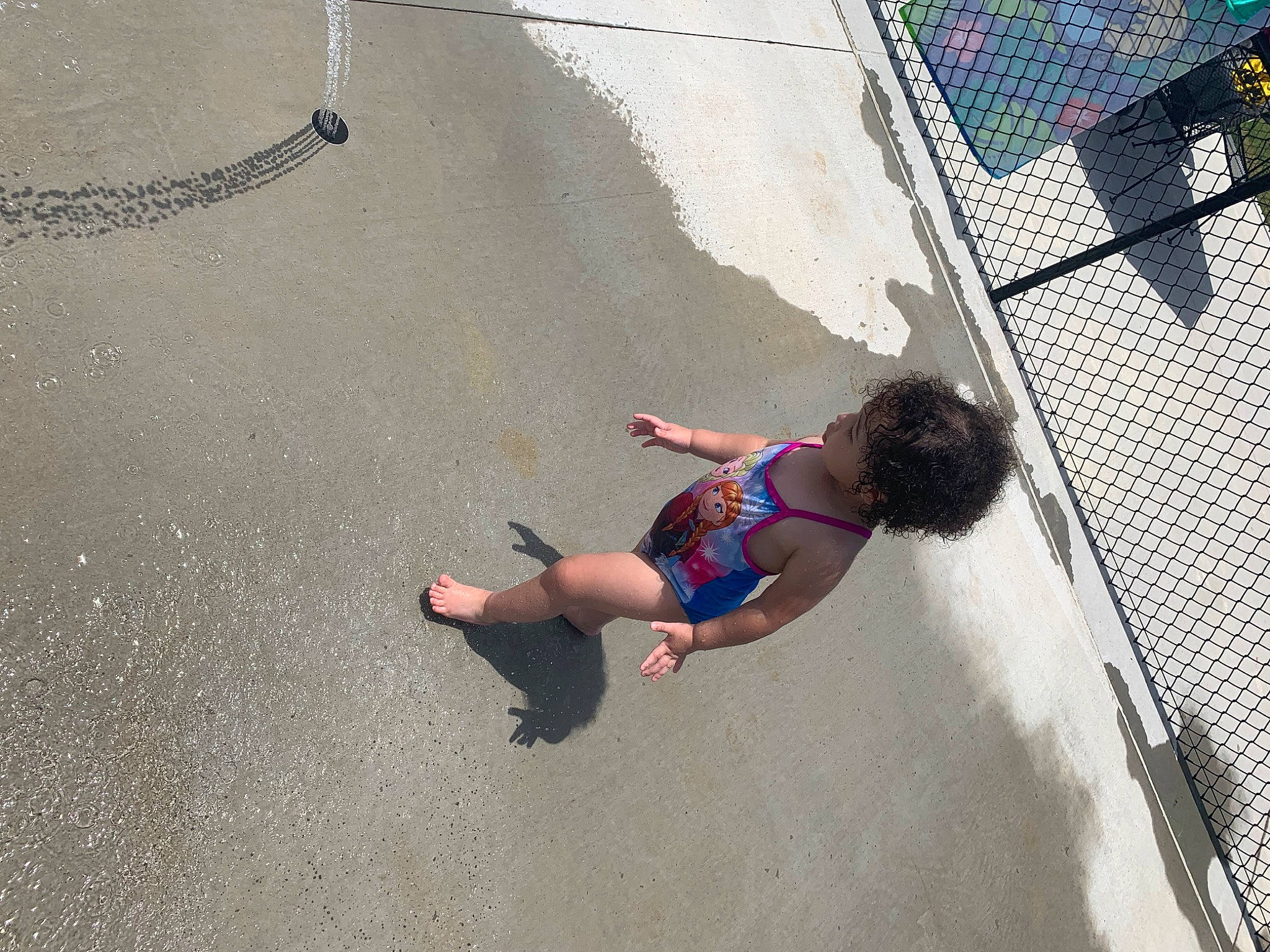 Kaylen is registered to the contest to win money with this photo: asphalt, child, city, concrete, foot, fun, human_leg, knee, leg, leisure, mesh, person, play, recreation, road_surface, shadow, shorts, sidewalk, thigh, toddler