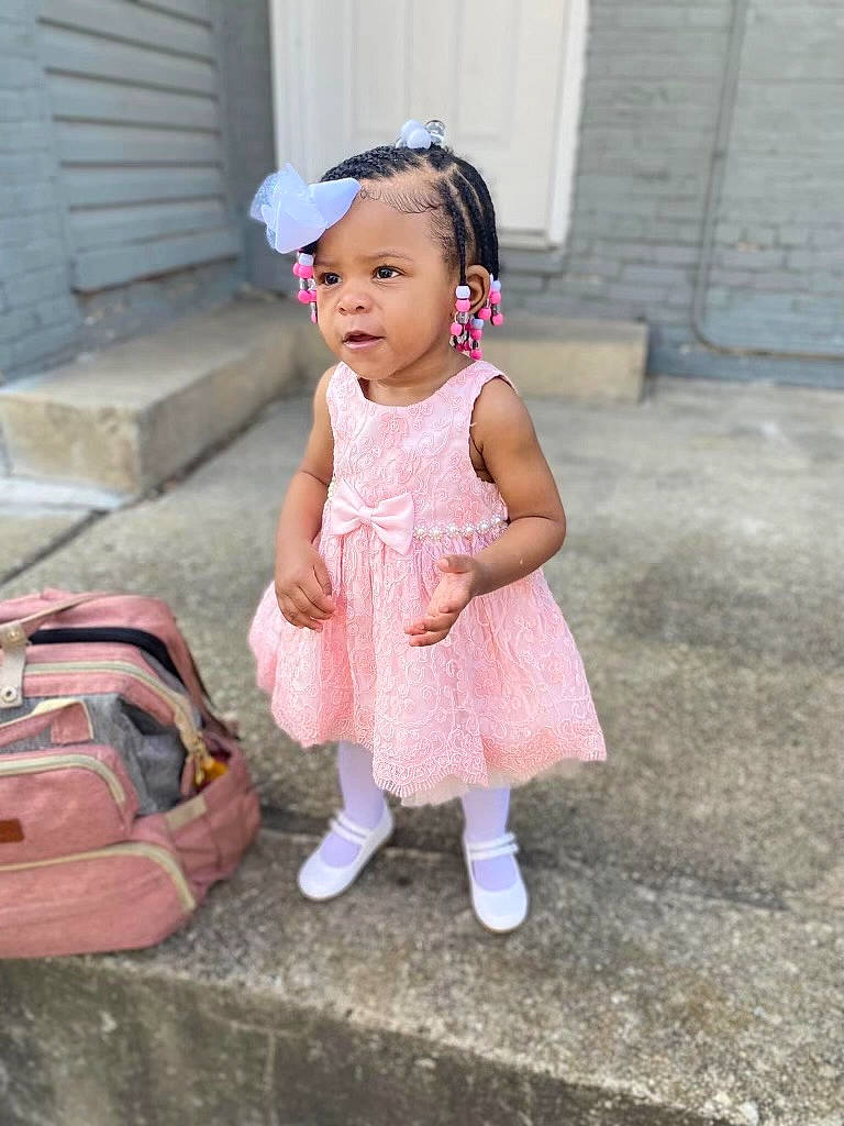 Teahni joined the competition — help win amazing prizes! baby, baby_toddler_clothing, backpack, bag, baggage, child, fashion_accessory, fun, grass, happy, luggage_and_bags, magenta, pattern, person, pink, recreation, sandal, sitting, smile, toddler