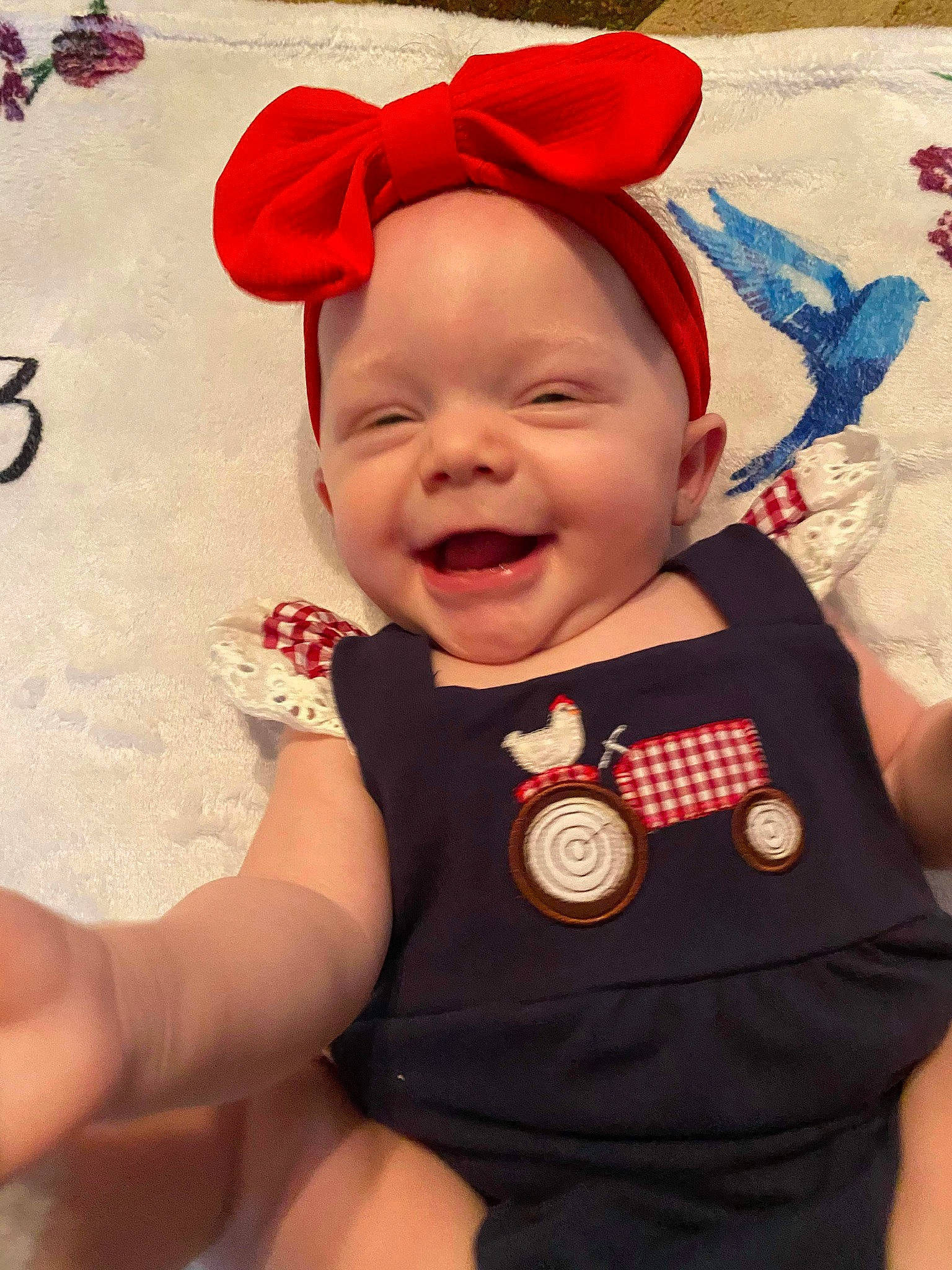 Brinley is registered to the contest to win money with this photo: baby, baby_toddler_clothing, child, facial_expression, happy, headgear, headwear, laugh, person, red, smile, toddler