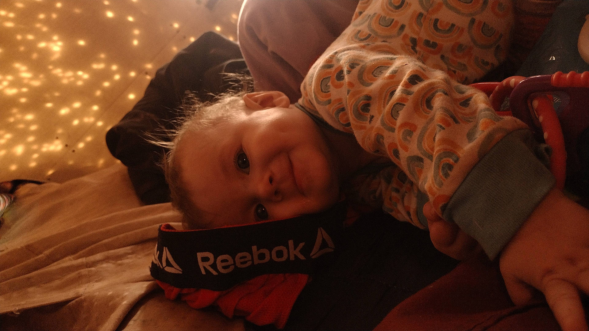 Southern is registered to the contest to win money with this photo: baby, blanket, bodypart, clothing, couch, cushion, face, finger, furniture, glove, hand, happy, head, homedecor, newborn, person, photography, portrait, quilt, smile