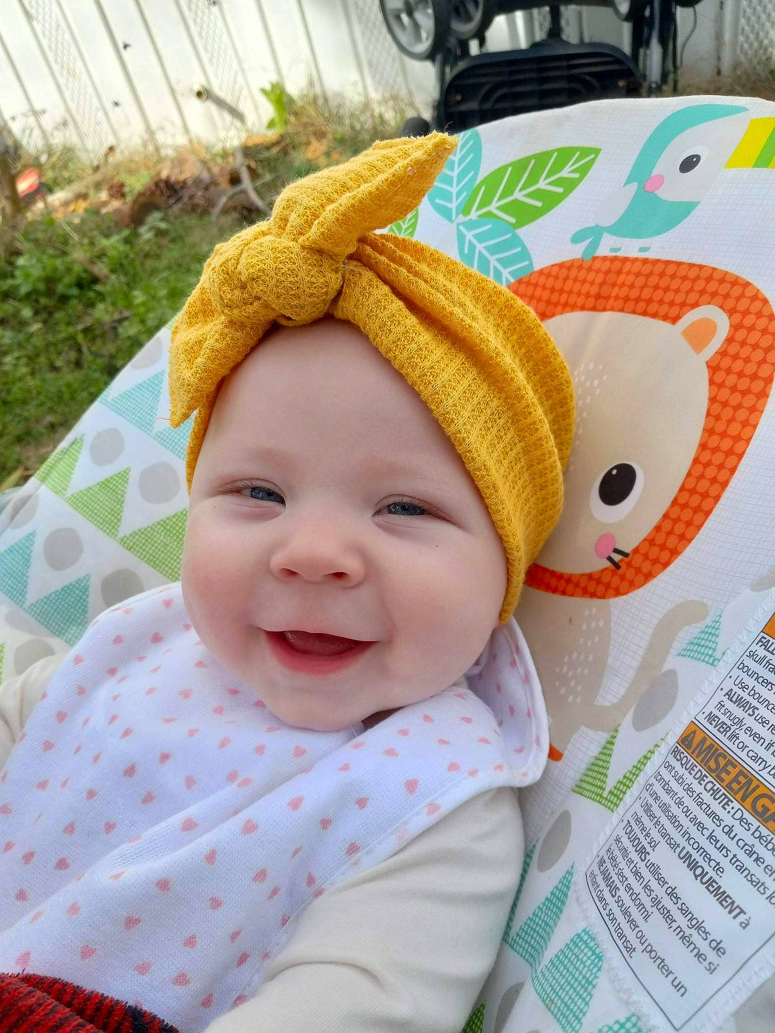Abbygail is registered to the contest to win money with this photo: baby, baby_laughing, baby_toddler_clothing, cap, child, costume_hat, fashion_accessory, fun, grass, happy, headgear, headwear, knit_cap, linens, pattern, person, plant, sleeve, smile, textile