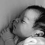 baby, sleeping, black_and_white, infant, closeup, portrait, peaceful, newborn, face, hand, skin, hair, clothing, rest, soft, quiet, cute, child, young, cozy