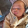 Lyam participe au concours pour gagner de l'argent avec cette photo : baby, infant, child, fluffy_jacket, beige, person, face, skin, hand, clothing, warm, cozy, indoor, light, texture, portrait, newborn, soft, holding, casual