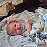 baby, blanket, bed, pacifier, child, infant, winnie_the_pooh, clothing, sleepwear, soft_toys, cute, lying_down, comfort, indoors, resting, person, newborn, fabric, toddler, relaxed