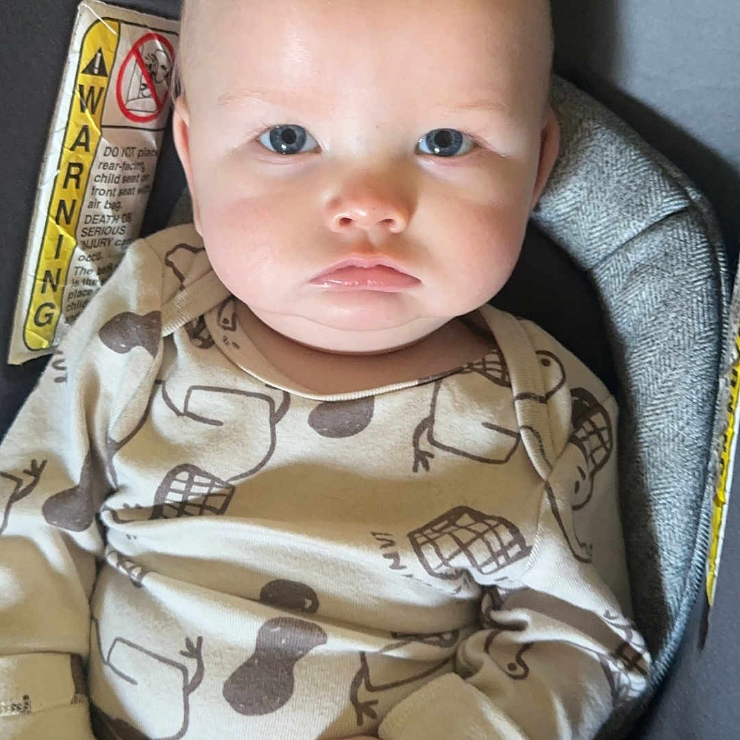 Bentley joined the competition — help win amazing prizes! baby, blanket, bodypart, clothing, couch, cushion, face, finger, furniture, hand, head, homedecor, newborn, pants, person, photography, portrait, shirt, sleeping, t_shirt