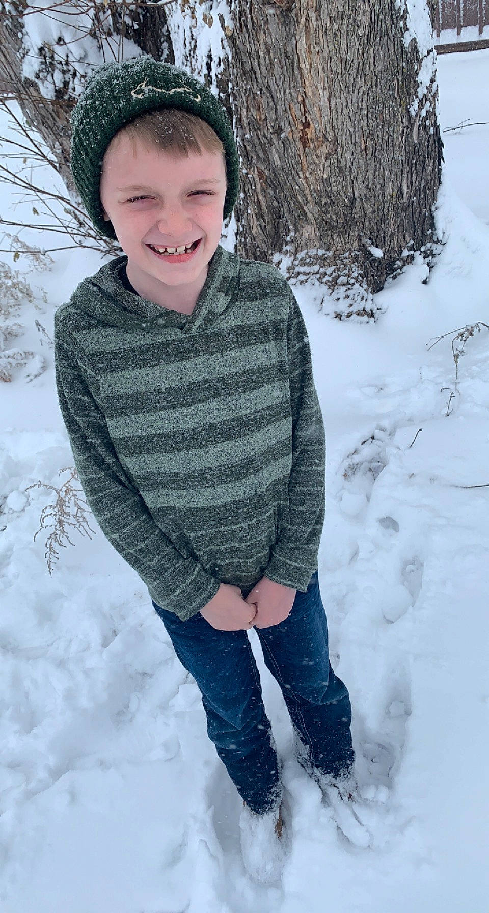 Ryland joined the competition — help win amazing prizes! denim, face, freezing, fun, fur, head, headgear, headwear, human_body, jacket, joy, outerwear, pattern, person, photograph, sleeve, smile, snow, standing, textile