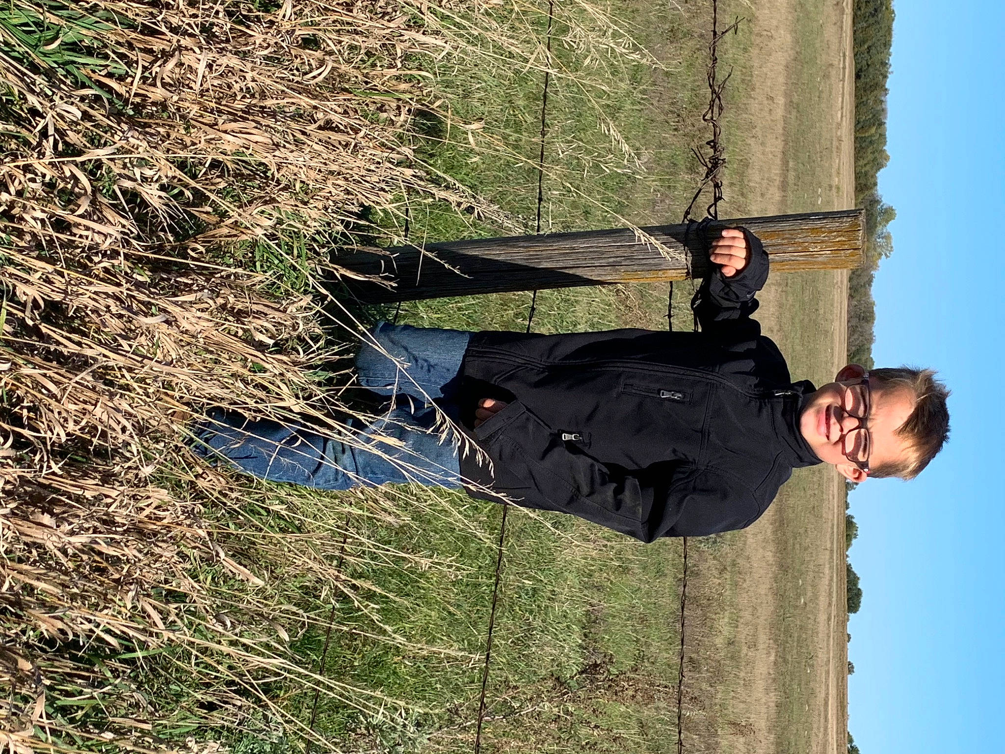 Brynlee joined the competition — help win amazing prizes! branch, fun, grass, grassland, happy, leisure, people_in_nature, person, plant, sky, smile, travel, tree, trunk, twig, woody_plant