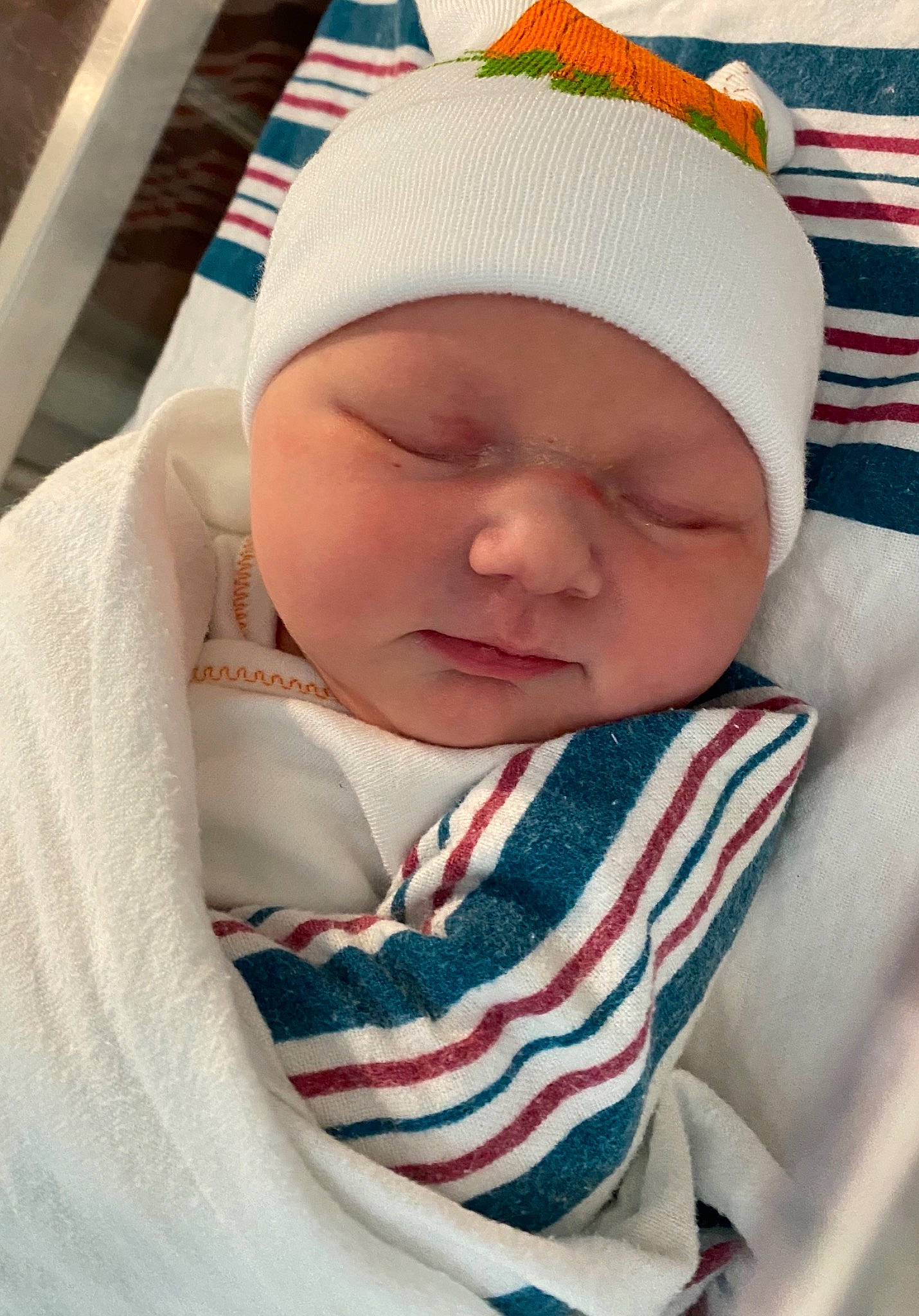 Adeline is registered to the contest to win money with this photo: baby, baby_products, baby_sleeping, baby_toddler_clothing, beanie, bedtime, cap, cheek, child, comfort, eyebrow, face, hat, headwear, knit_cap, linens, mouth, nap, nose, person