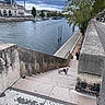 Indigo a rejoint le concours — aidez-le/la à gagner de superbes lots ! architecture, boats, cityscape, cloudy_sky, dog, eiffel_tower, historic_building, leash, outdoor, paris, promenade, river, riverside, small_dog, stairs, stone_wall, travel, trees, urban, water