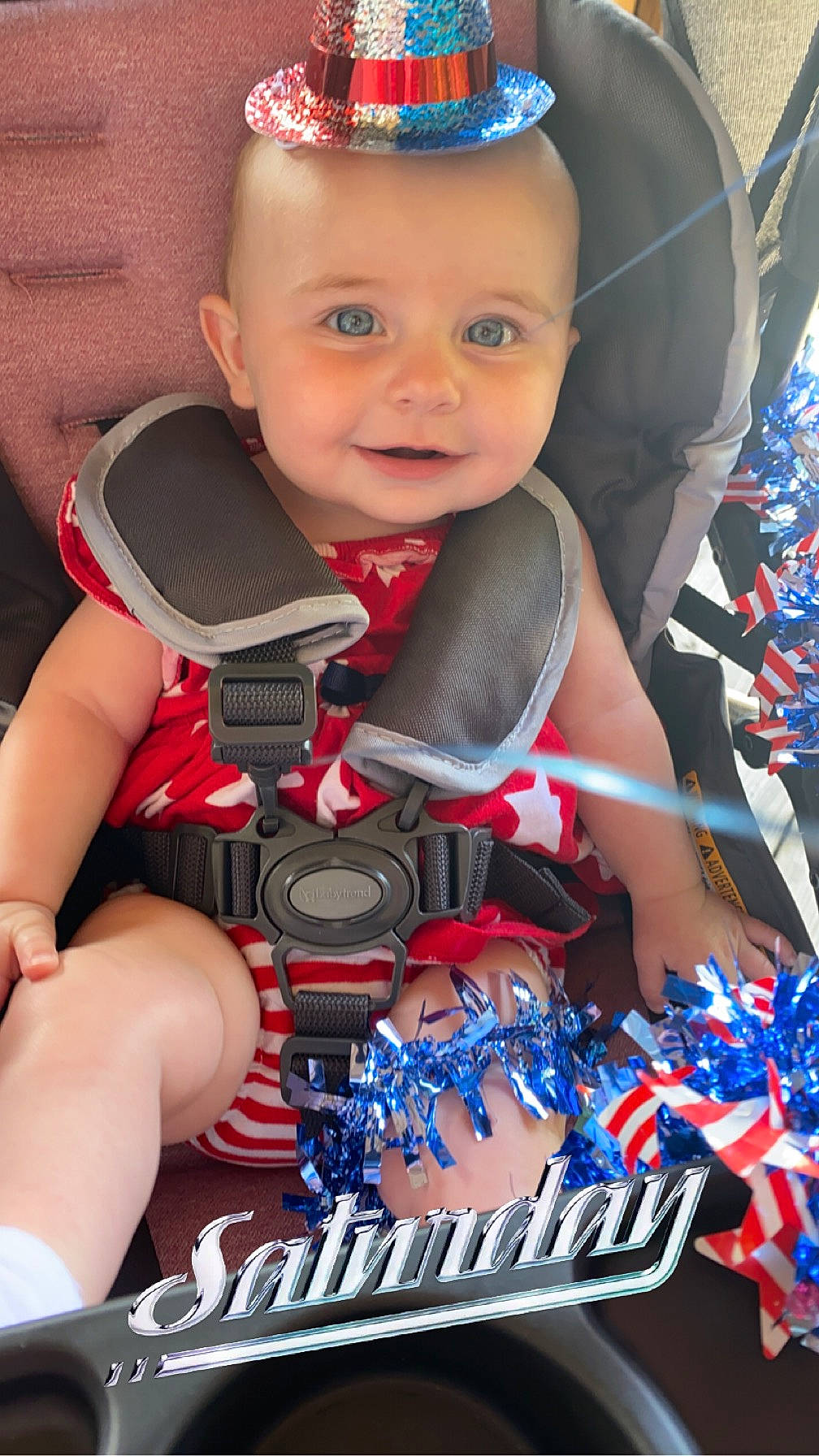 Kahlani is registered to the contest to win money with this photo: auto_part, baby, baby_carriage, baby_products, baby_toddler_clothing, blue, carmine, child, electric_blue, fashion_accessory, fun, happy, joy, person, personal_protective_equipment, sitting, skin, smile, thigh, thumb