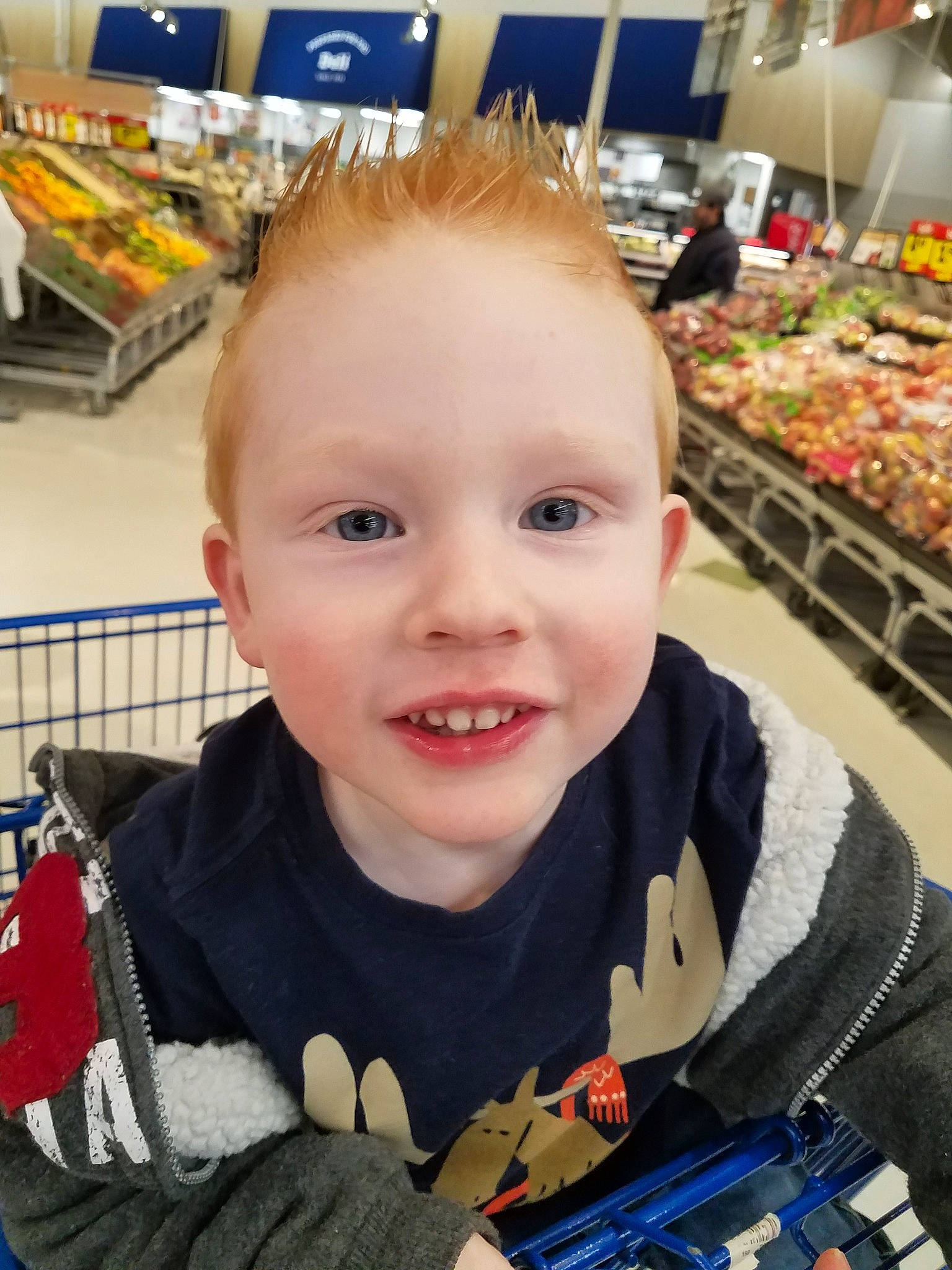 Edison is registered to the contest to win money with this photo: baby, cheek, child, ear, eye, face, facial_expression, grocery_store, head, male, outerwear, person, product, skin, smile, supermarket, toddler, vacation