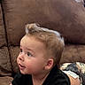 Bowen joined the competition — help win amazing prizes! baby, child, infant, couch, brown_couch, black_shirt, camo_pants, indoor, window, window_blinds, curious, lying_down, cute, portrait, person, skin, hair, expression, home, living_room