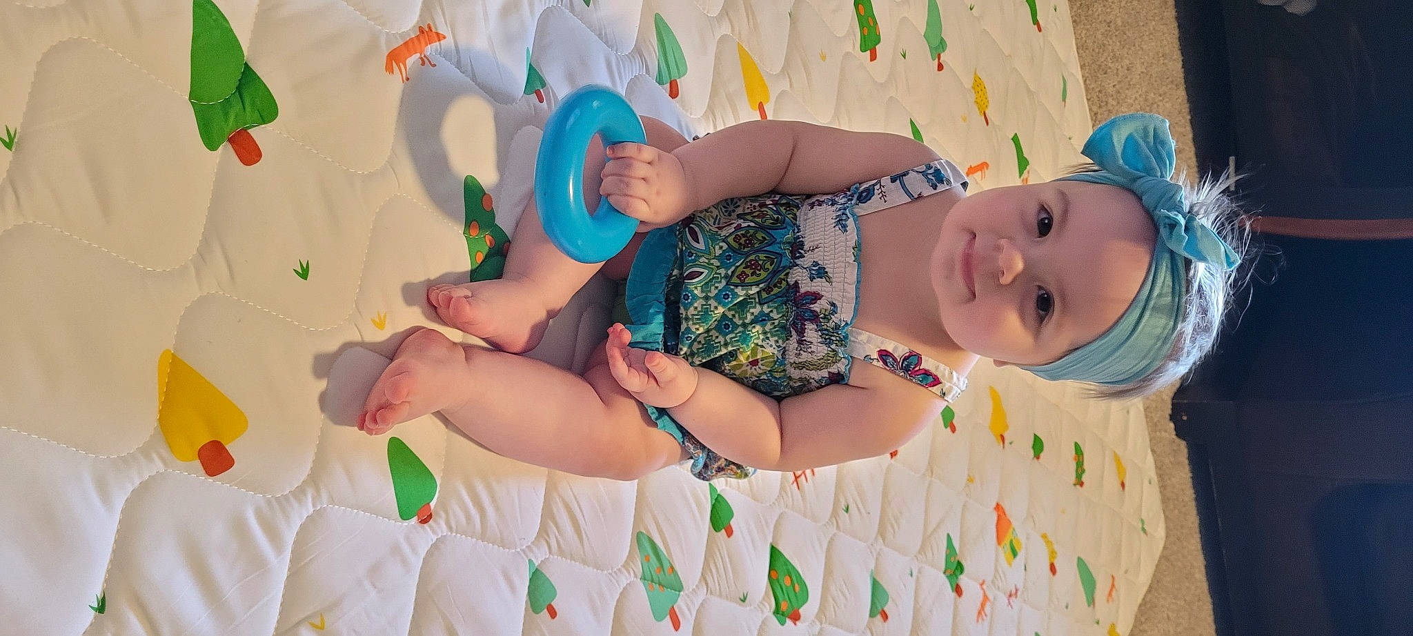 Emerson is registered to the contest to win money with this photo: arm, baby, baby_toddler_clothing, beauty, child, finger, fun, green, hand, happy, headwear, leisure, pattern, people, person, pink, product, skin, smile, summer