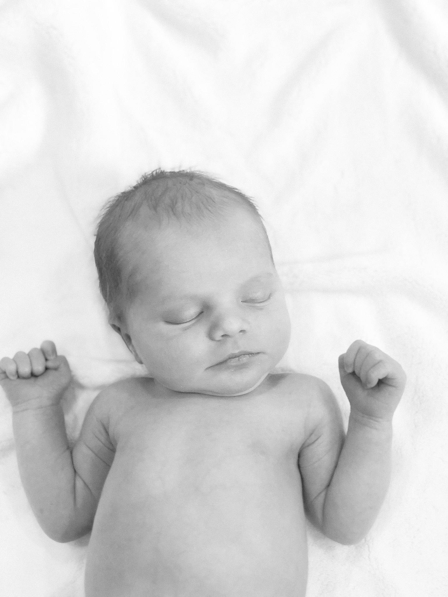 Hattie is registered to the contest to win money with this photo: arm, baby, black, black_and_white, cheek, child, eye, face, finger, hand, head, lip, monochrome, monochrome_photography, nose, person, photograph, photography, skin, toddler