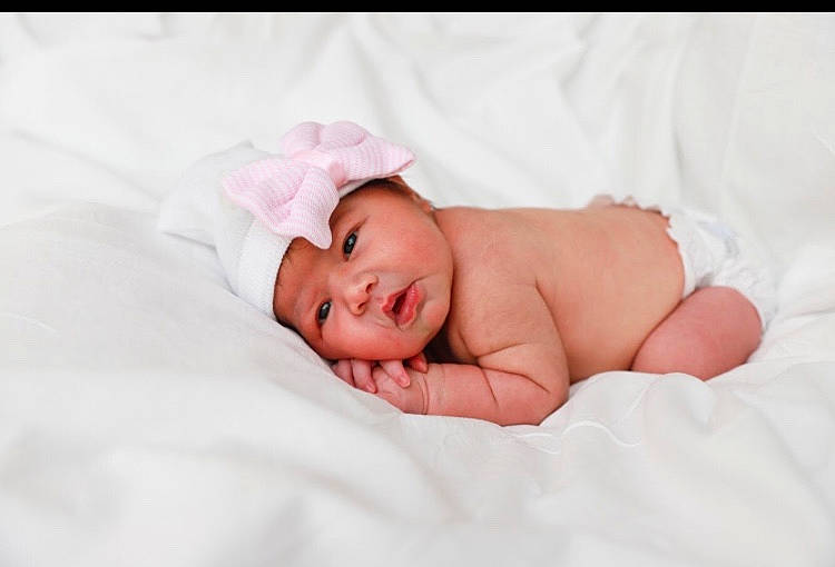 Samantha is registered to the contest to win money with this photo: baby, baby_sleeping, beauty, cheek, child, close_up, eye, face, hair_accessory, head, headgear, headwear, lip, person, photograph, photography, pink, portrait_photography, product, skin