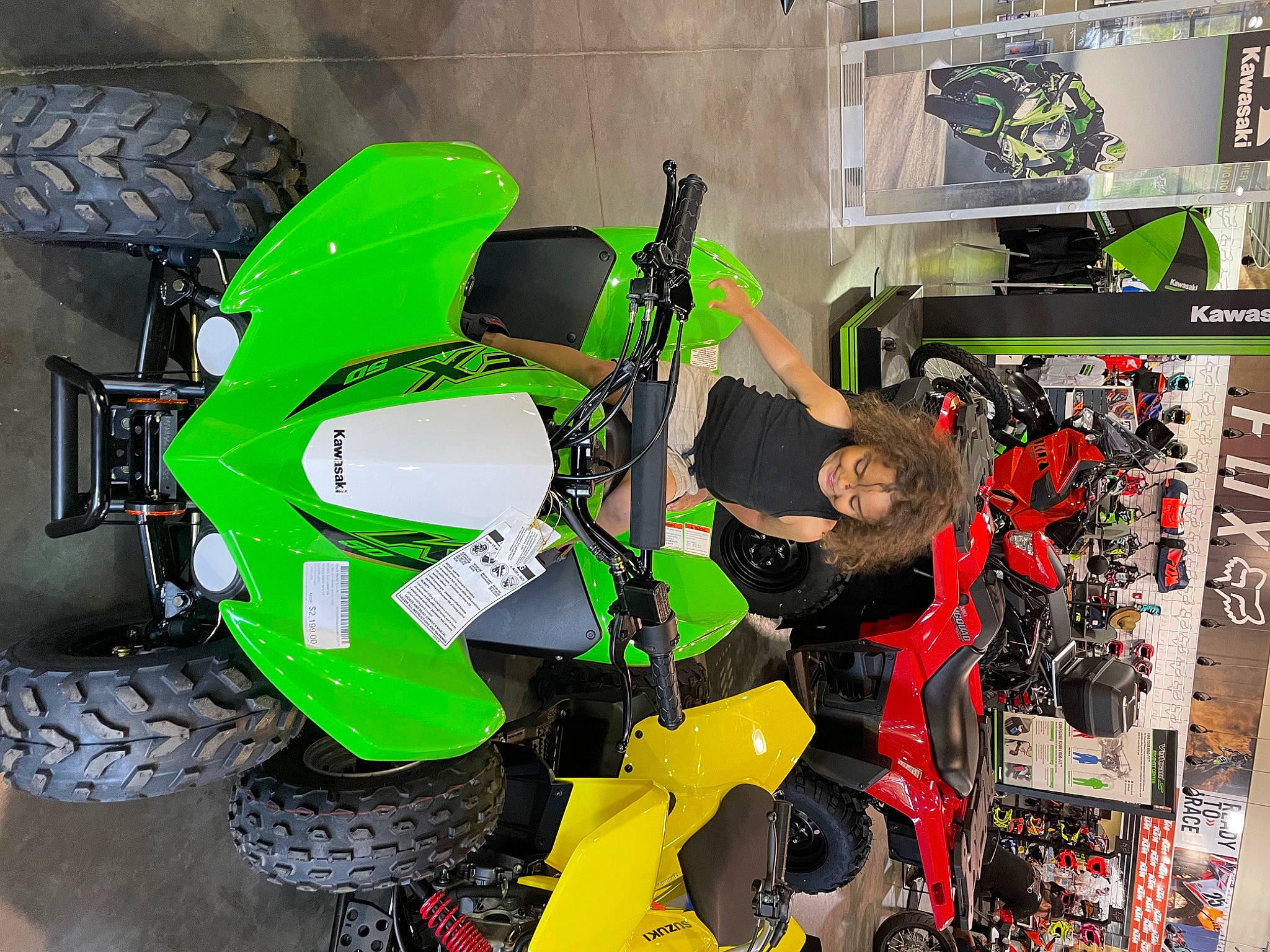 Tay joined the competition — help win amazing prizes! auto_part, automotive_design, automotive_exterior, automotive_lighting, automotive_tire, automotive_wheel_system, bumper, fender, fictional_character, joy, machine, motor_vehicle, motorcycle, motorcycle_accessories, motorsport, person, personal_protective_equipment, rim, tire, tread