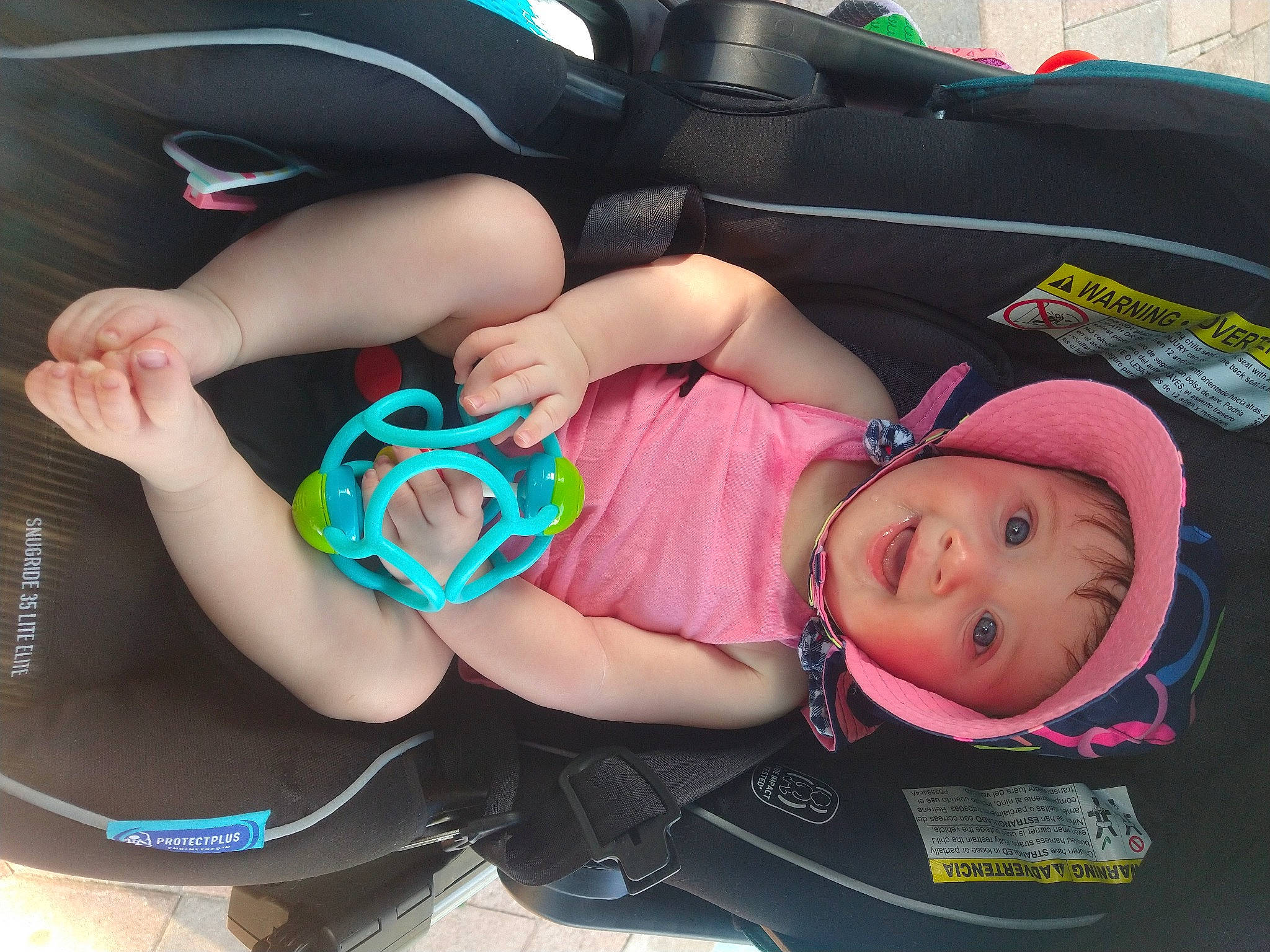 Journey joined the competition — help win amazing prizes! baby, baby_carriage, baby_products, baby_toddler_clothing, child, comfort, elbow, fun, headgear, headwear, human_leg, knee, lap, leisure, mouth, person, pink, shorts, smile, thigh