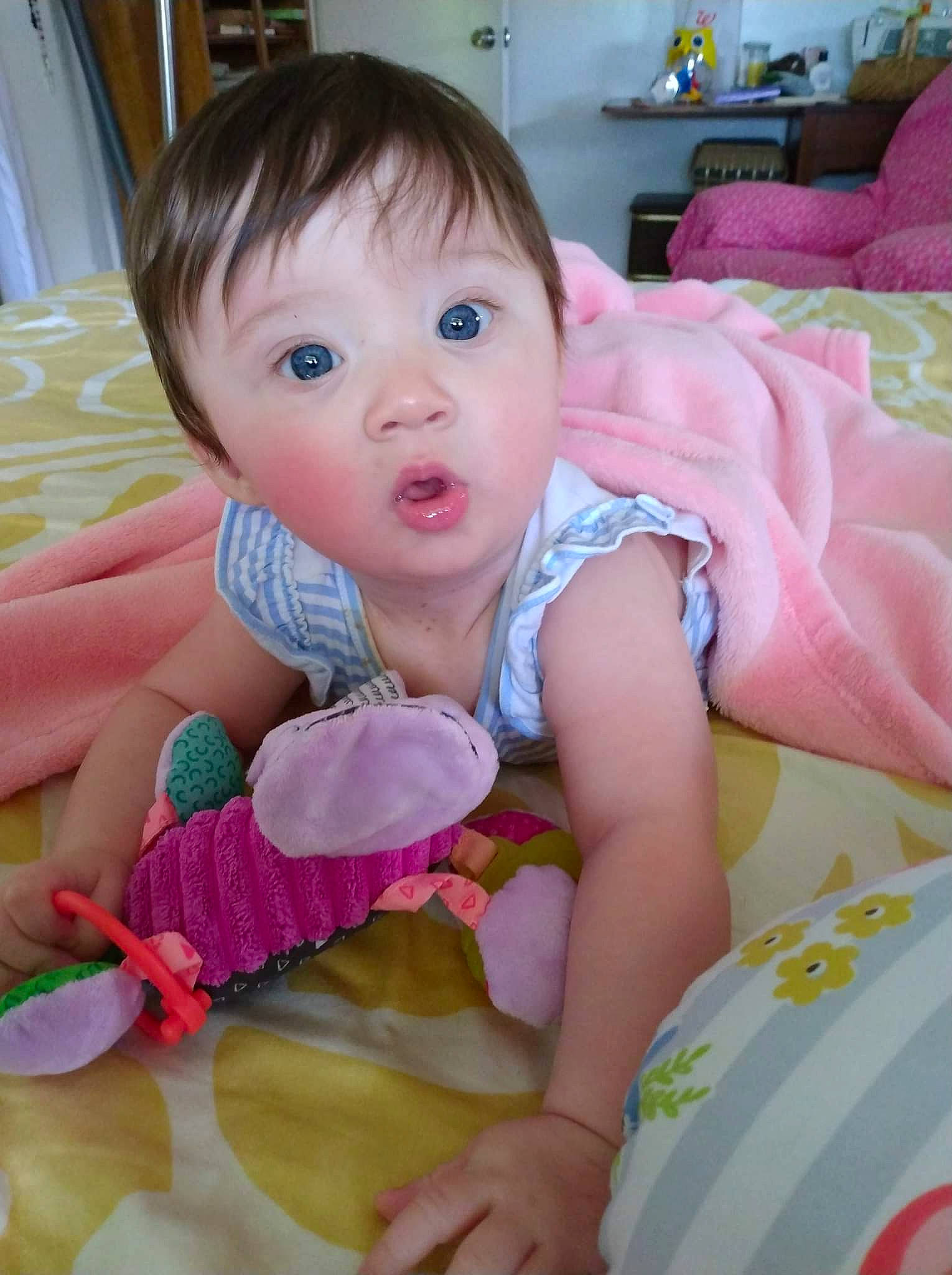 Journey joined the competition — help win amazing prizes! baby, baby_playing_with_toys, baby_toddler_clothing, cheek, comfort, eye, facial_expression, finger, fun, hairstyle, happy, head, iris, mouth, nose, person, pink, product, skin, surprise