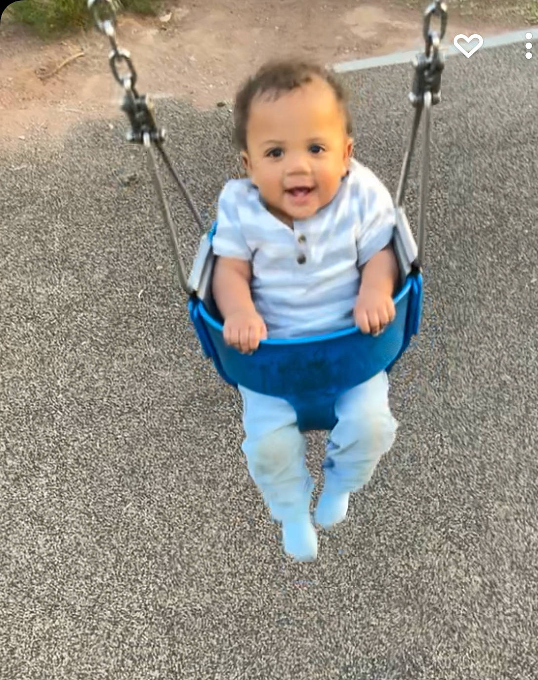 Reign is registered to the contest to win money with this photo: baby, baby_toddler_clothing, child, city, electric_blue, face, fun, grass, happy, leisure, people_in_nature, person, photograph, playground, public_space, recreation, sleeve, smile, swing, toddler