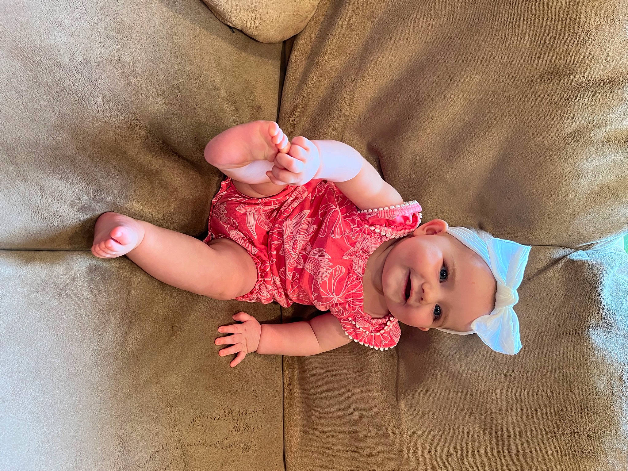 Oakley joined the competition — help win amazing prizes! arm, baby, baby_toddler_clothing, cheek, comfort, dress, eye, face, finger, hand, happy, head, headwear, human_body, joy, person, pink, skin, sleeve, sock